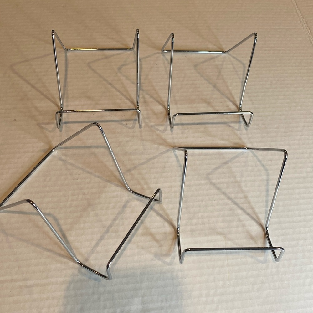 Silver metal display stands square. Four pack.